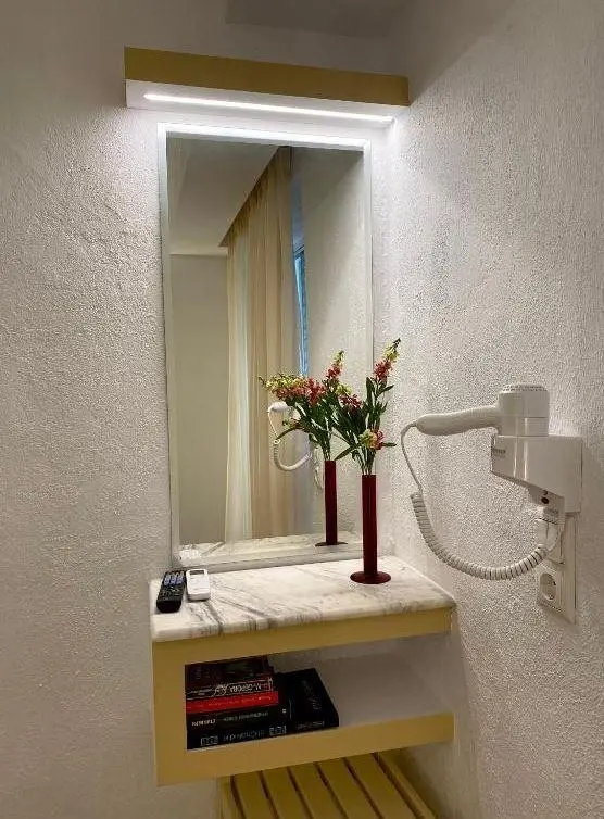 Łazienka w pokoju hotelu Olympic Kosmas Hotel