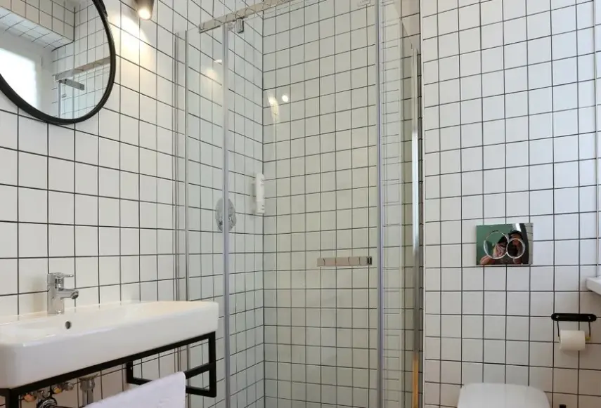 Łazienka w pokoju hotelu Wozna 11 Aparthouse
