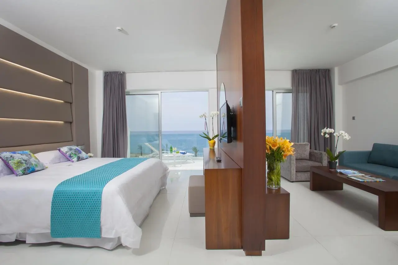 King Evelthon Beach Hotel and Resort — KING EVELTHON BEACH HOTEL AND  RESORT