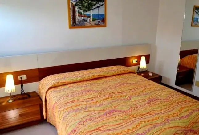 Pokój w hotelu Residence Ai Ginepri
