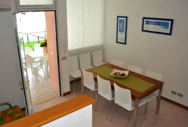 Restauracja i jedzenie w hotelu Residence Ai Ginepri