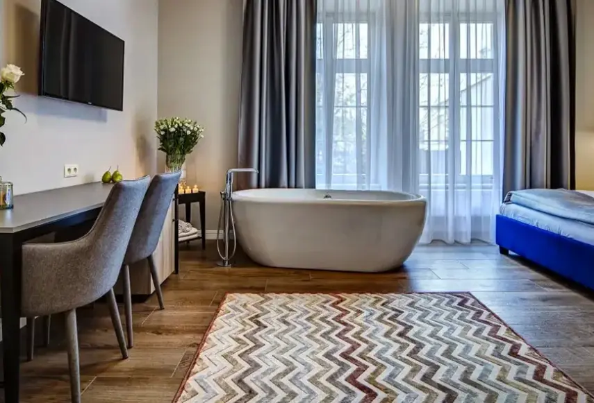 Łazienka w pokoju hotelu Joyinn Aparthotel