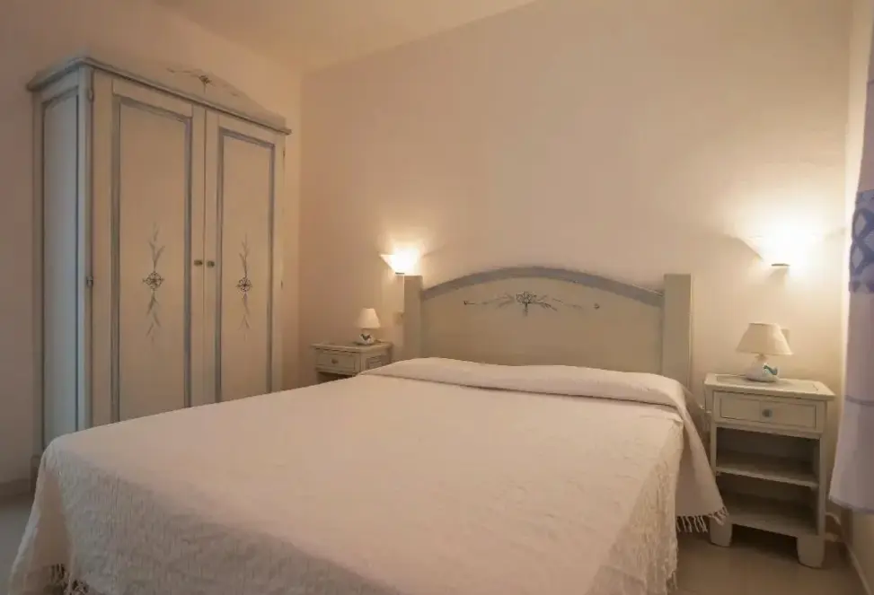 Pokój w hotelu Porto Coda Cavallo Residence