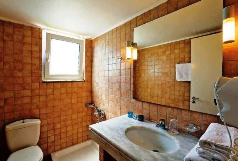 Łazienka w pokoju hotelu Katikies Studios Apartments