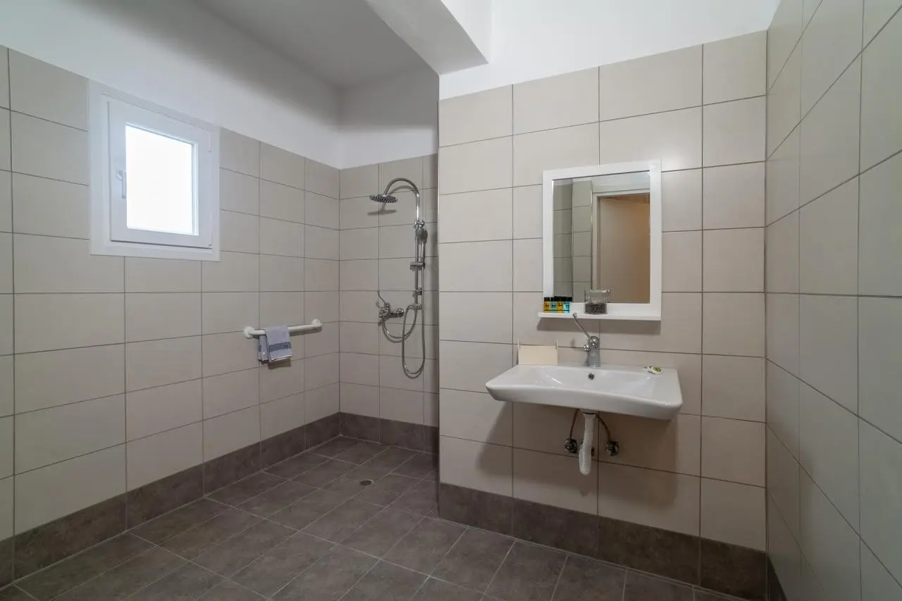 Łazienka w pokoju hotelu Amaryllis Hotel