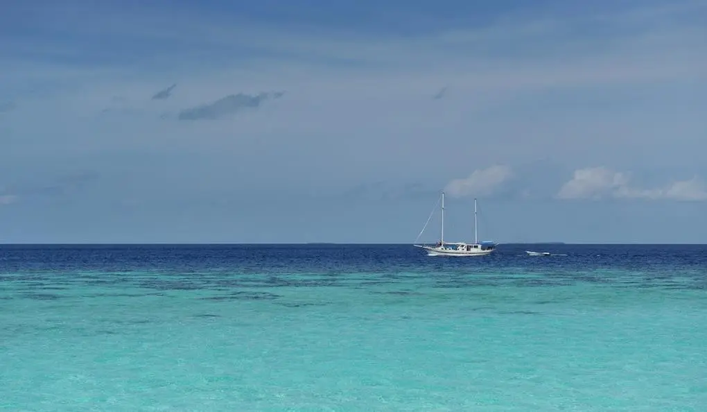 Komandoo Island Resort & Spa — KOMANDOO ISLAND RESORT & SPA