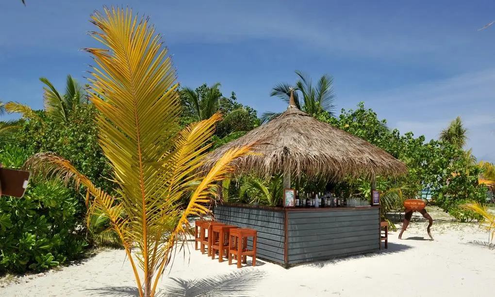 Komandoo Island Resort & Spa — KOMANDOO ISLAND RESORT & SPA