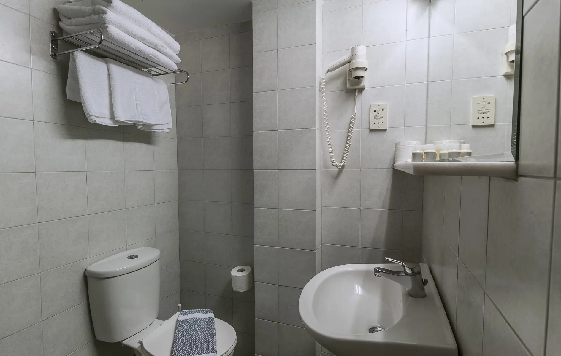 Łazienka w pokoju hotelu Hermes